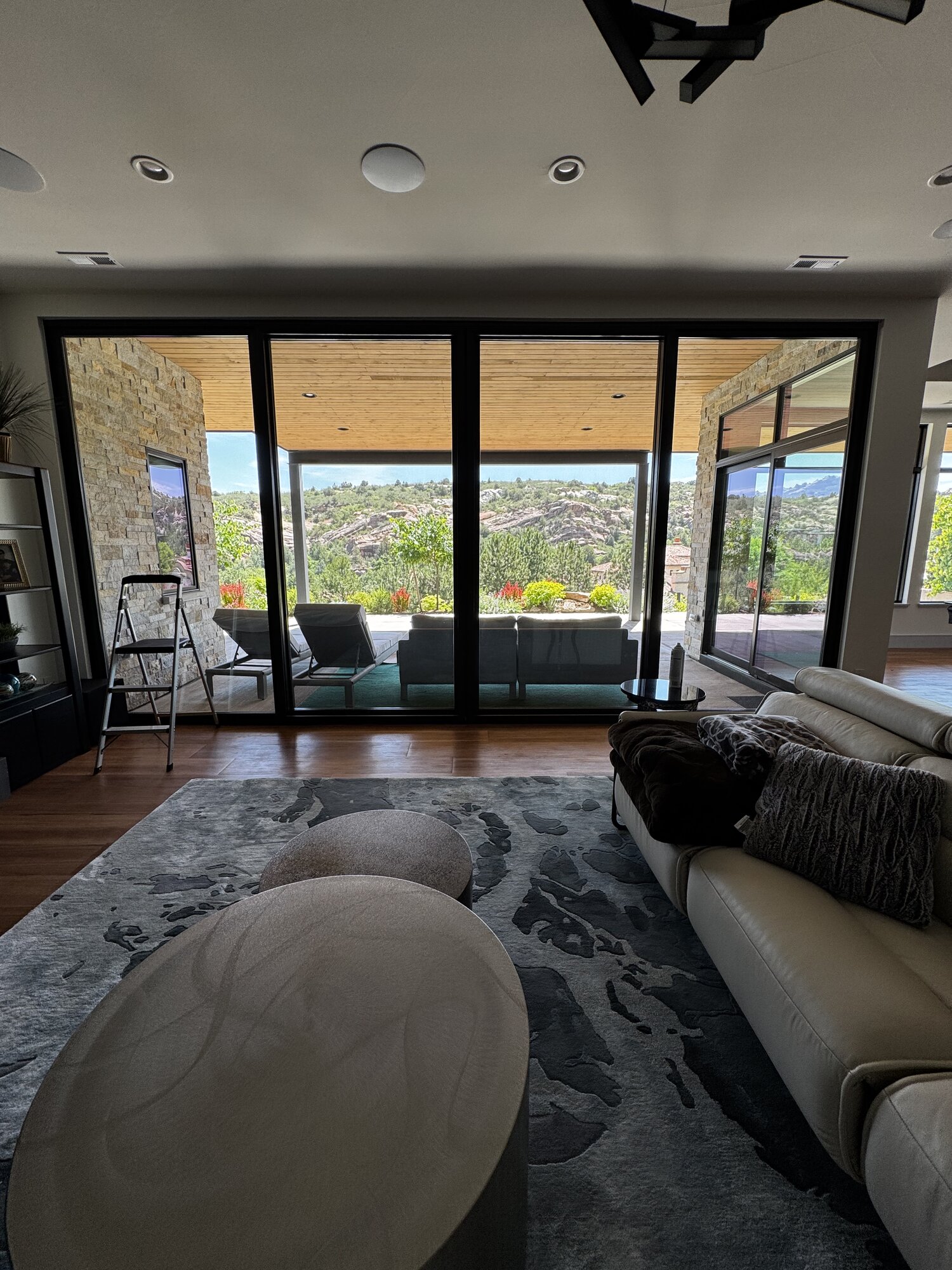 Spotless floor-to-ceiling living room windows after cleaning