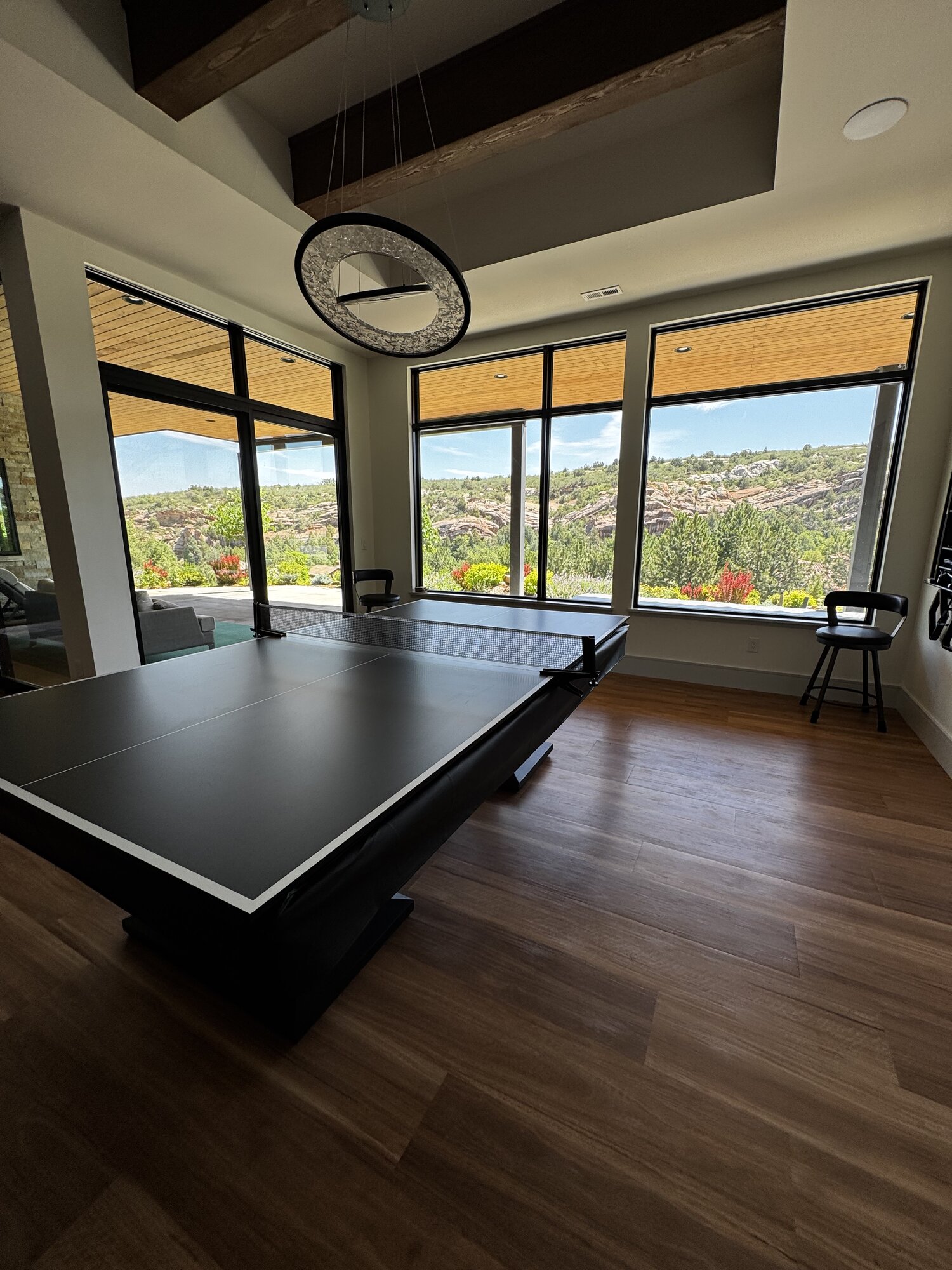 Game room windows cleaned inside and out with rock formation view